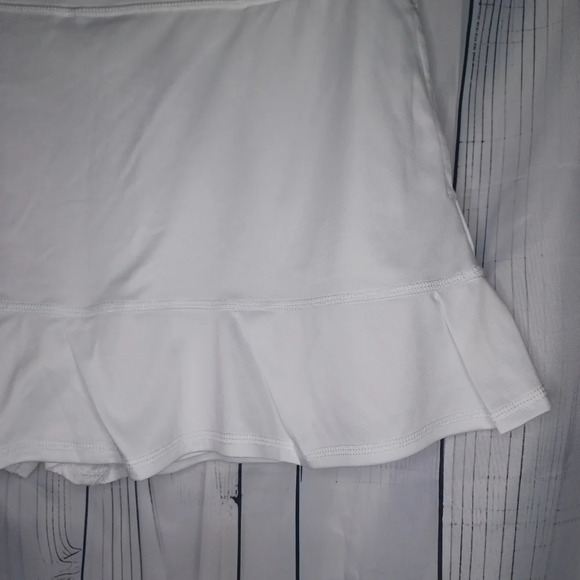 Grand Slam performance tennis skirt with shorts. - Picture 2 of 11